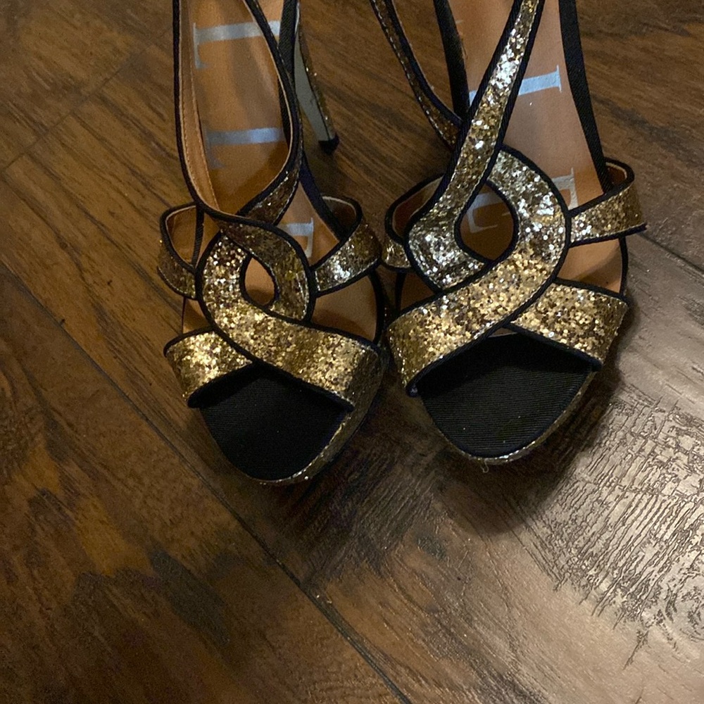 Black and gold heels